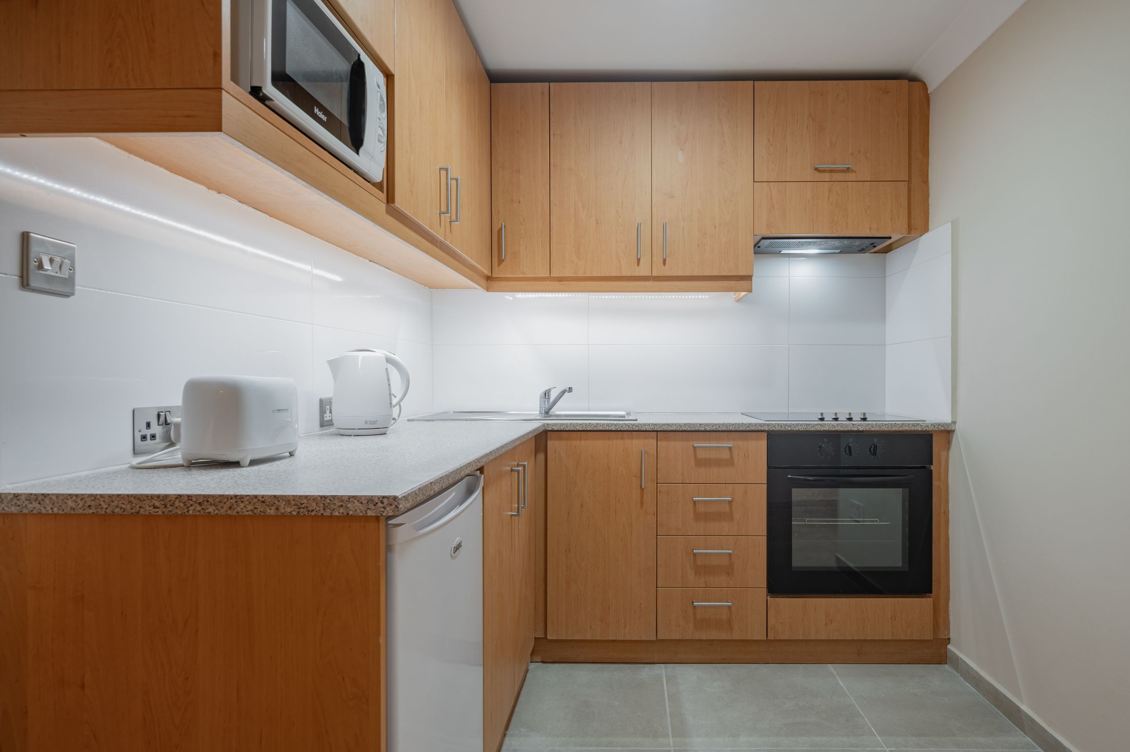 Kitchenette and dining space in 2-Bedroom Apartment
