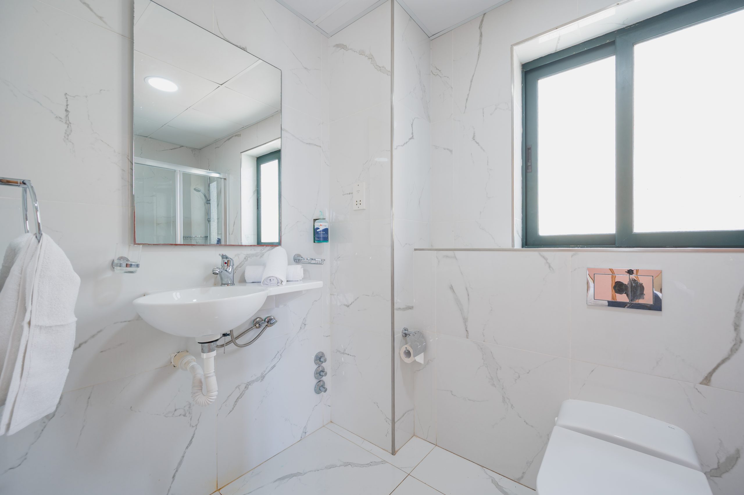Bathroom with shower in Triple Room