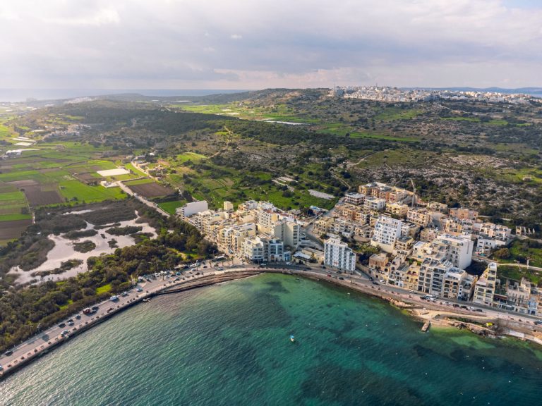 birds eye view of the xemxija bay where Xemxija Bay Hotel is located